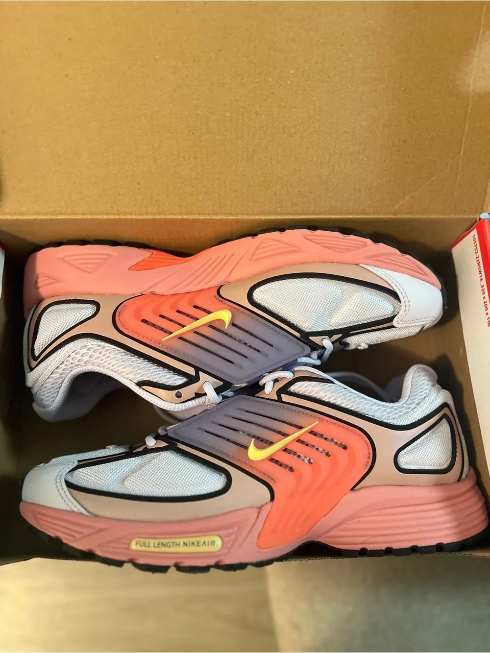 Nike men’s Pink and Gray Sneakers with Yellow Swoosh